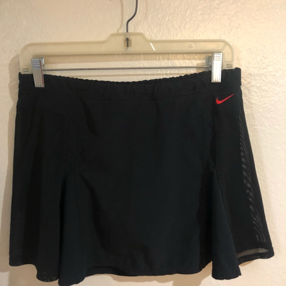 Nike small tennis skirt/skort w/ mesh side panels
